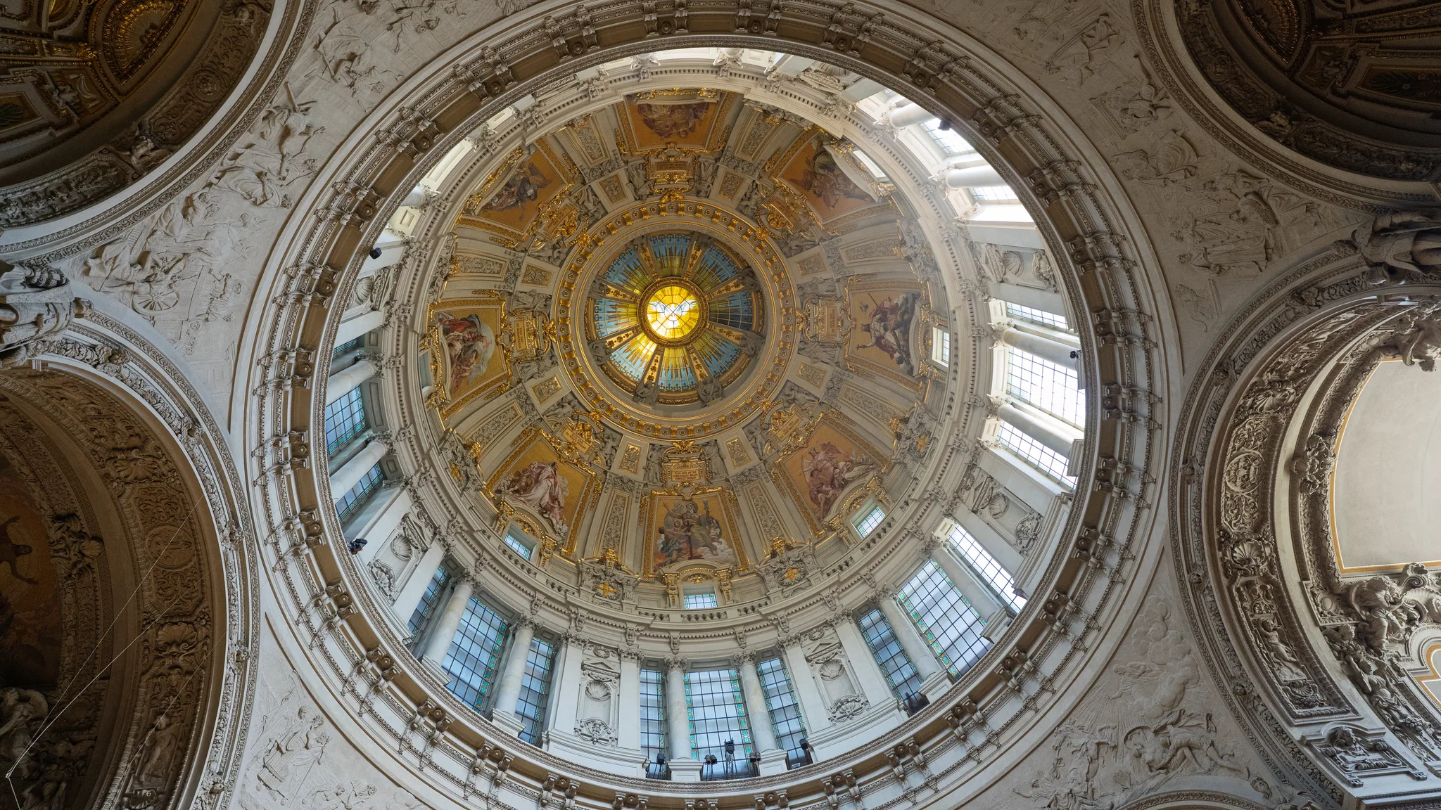 Looking up into the painted and gilded dome of Berlin Cathedral